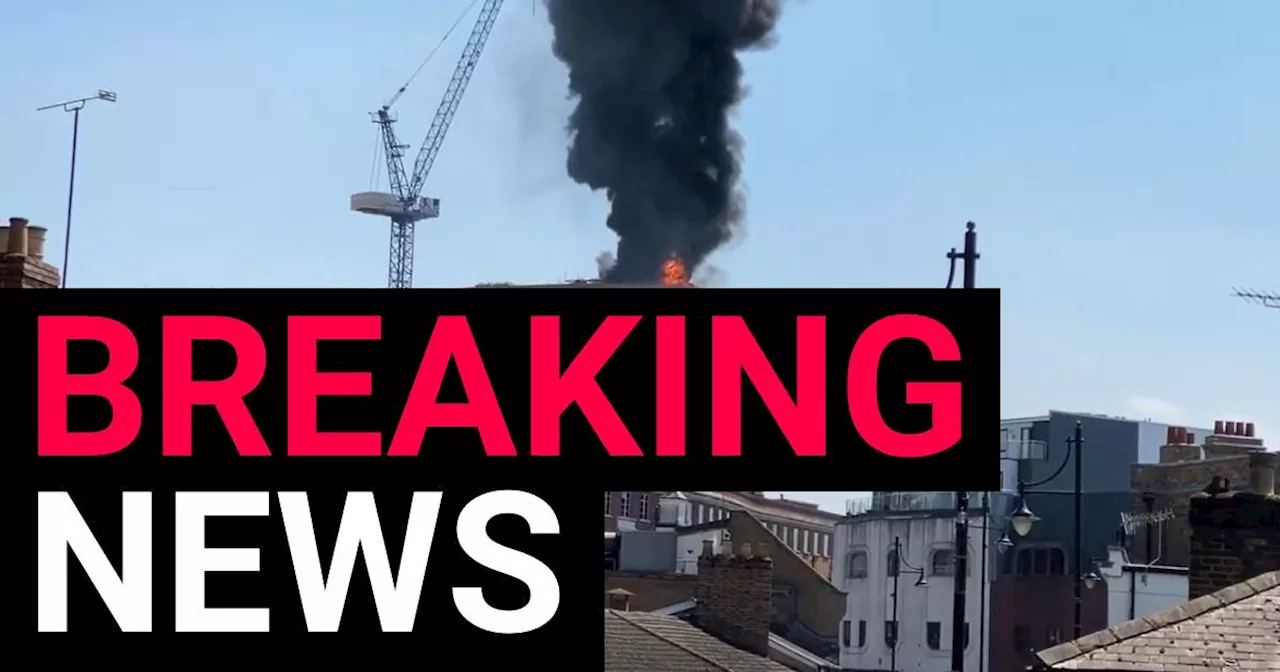 Fire in Staines as huge plume of smoke engulfs town centre tower block