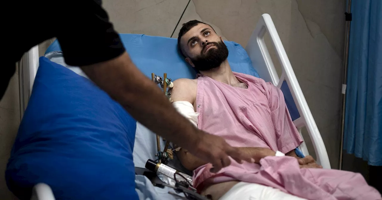 Palestinian man describes being shot, beaten and tied to an Israeli army jeep