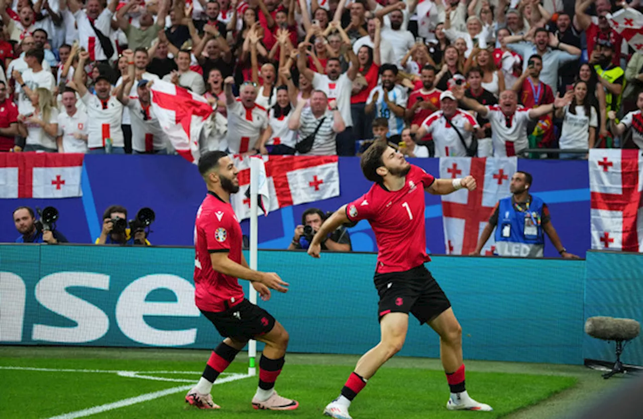 Georgia shock Portugal to qualify for Euros last-16 on manic, magical night