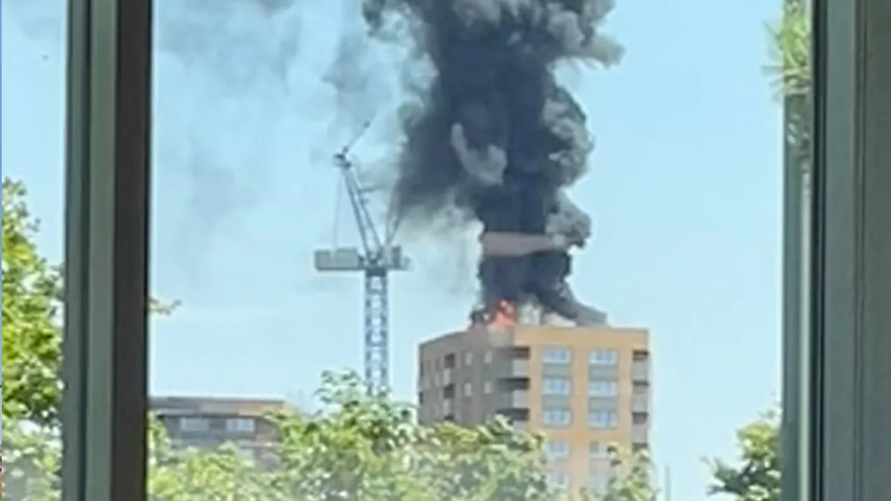 Staines fire updates: Tower block erupts into flames with plume of black smoke seen for miles...