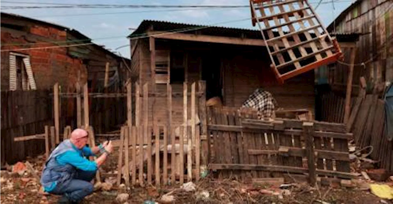 Flooded Brazil “ghost town” a climate warning