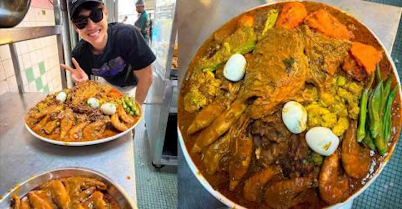 SG man finishes RM300 plate of nasi kandar at famous Penang restaurant