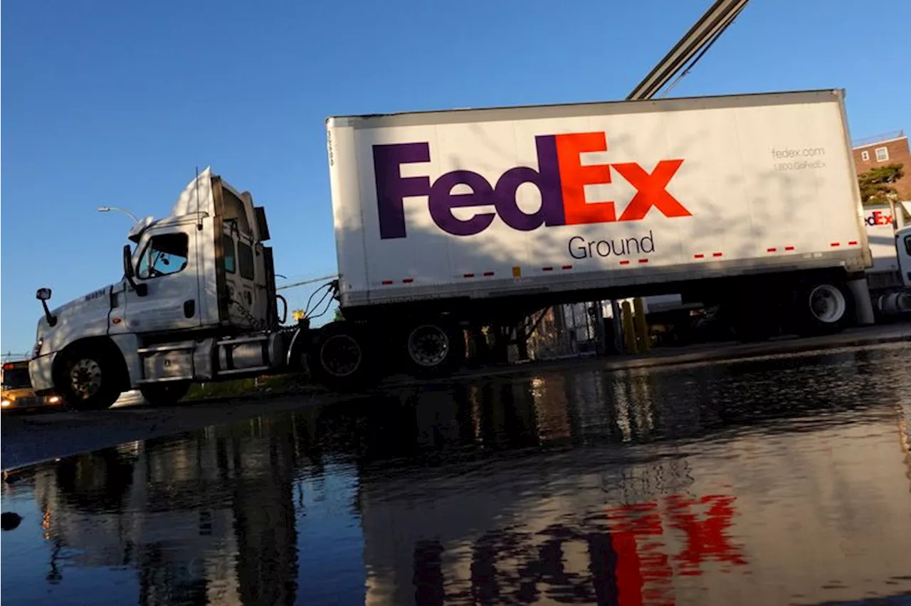 FedEx climbs on cheery annual profit forecast, freight business review