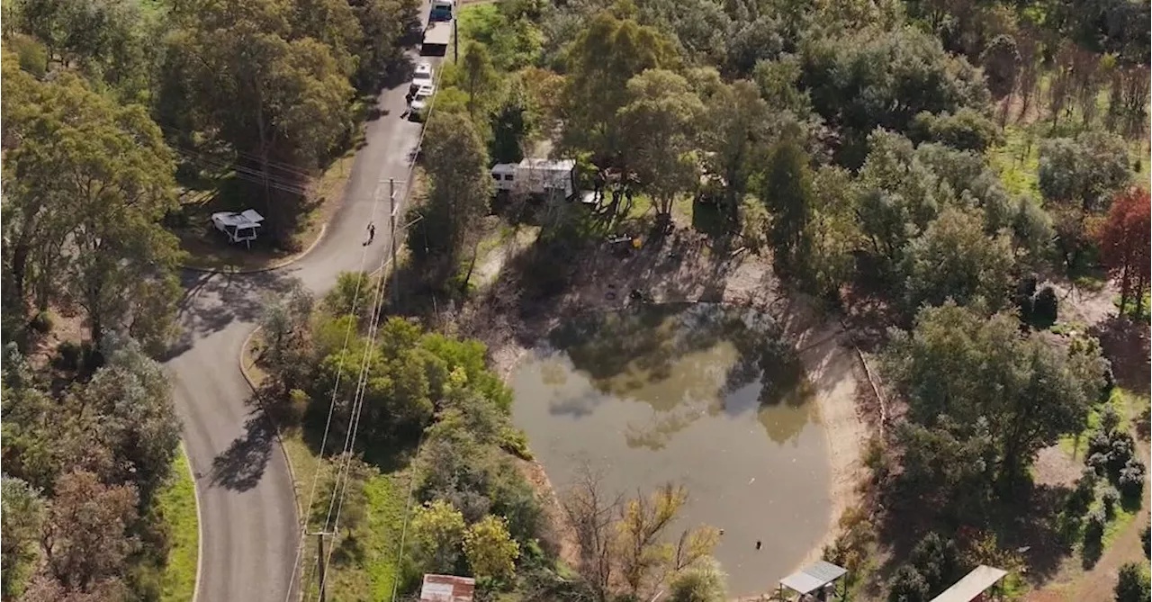 Body found in car submerged in dam in Perth's eastern suburbs