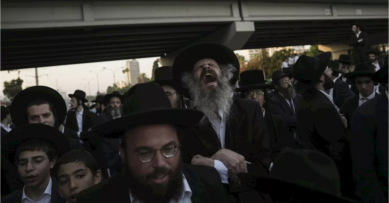 P﻿rotesters blocked a major highway after Israel's Supreme Court ordered the drafting of ultra-Orthodox youth into the military.