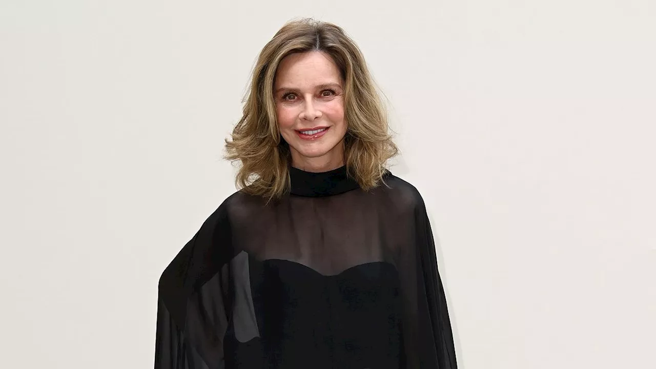 Calista Flockhart, 59, steals the spotlight in an elegant strapless jumpsuit as ageless Ally McBeal...