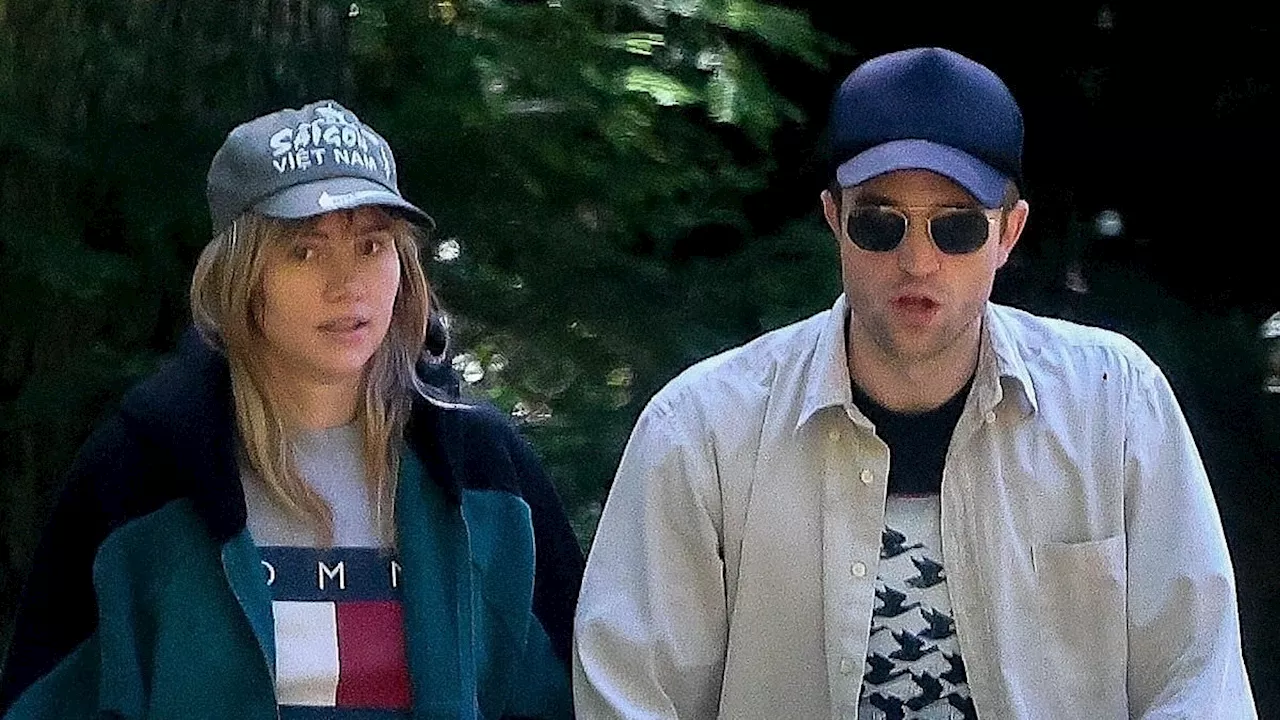 Suki Waterhouse and Robert Pattinson enjoy a leisurely stroll with their baby daughter