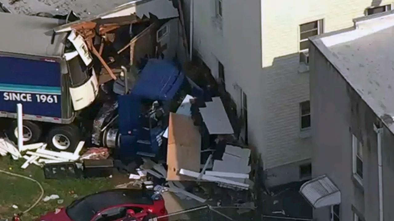 Tractor-trailer driver barrels into back of New Jersey home