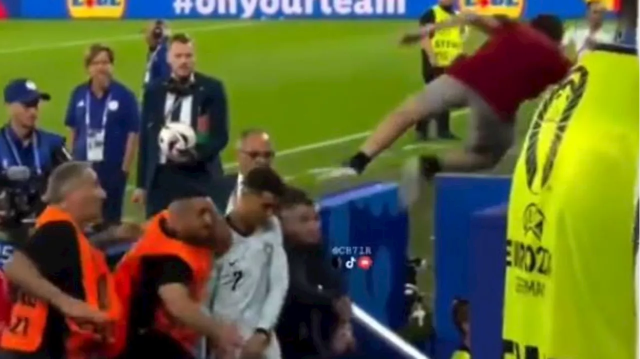 Ronaldo narrowly avoids lunging fan in viral clip after shock Euro defeat