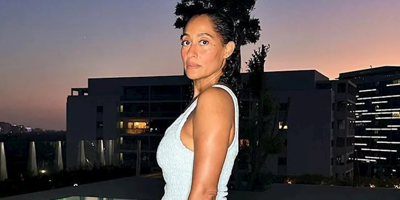 Tracee Ellis Ross Proves Knee-High Boots Can Be a Go-To Summer Staple