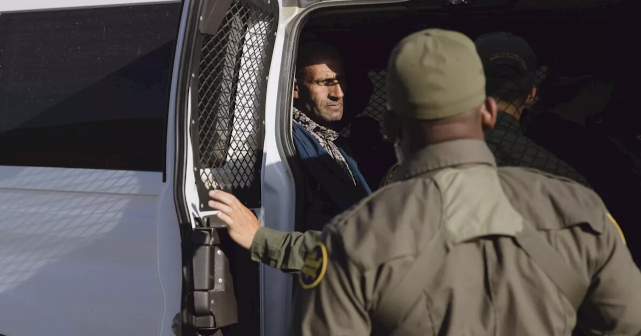 At the border, migrants ‘wait and see’ as encounters with Border Patrol dip 40%