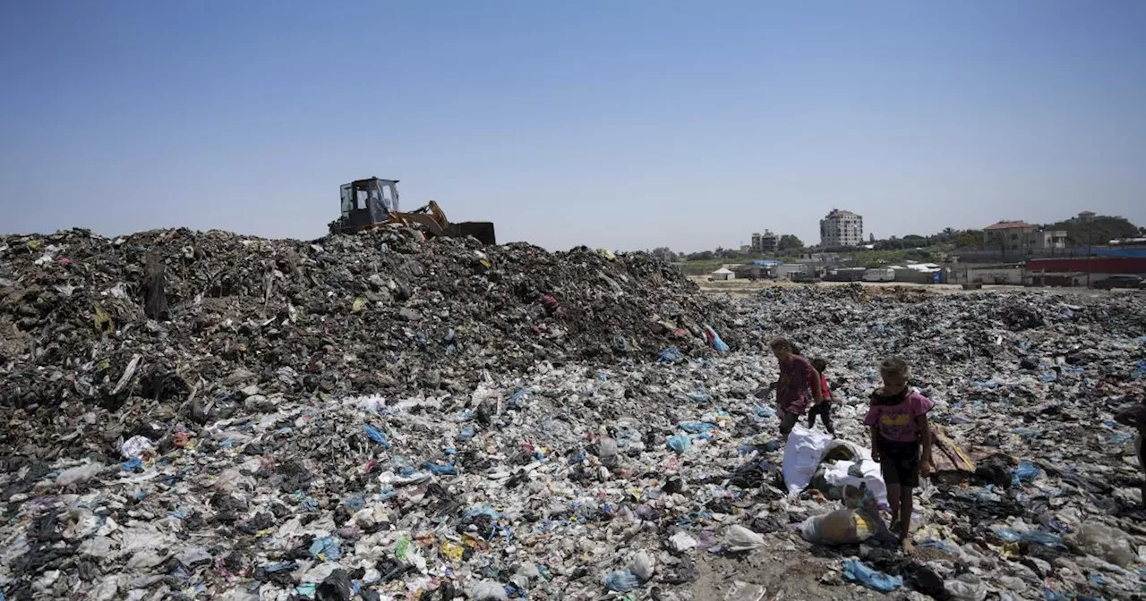 In the searing heat of the Gaza summer, Palestinians are surrounded by sewage and garbage