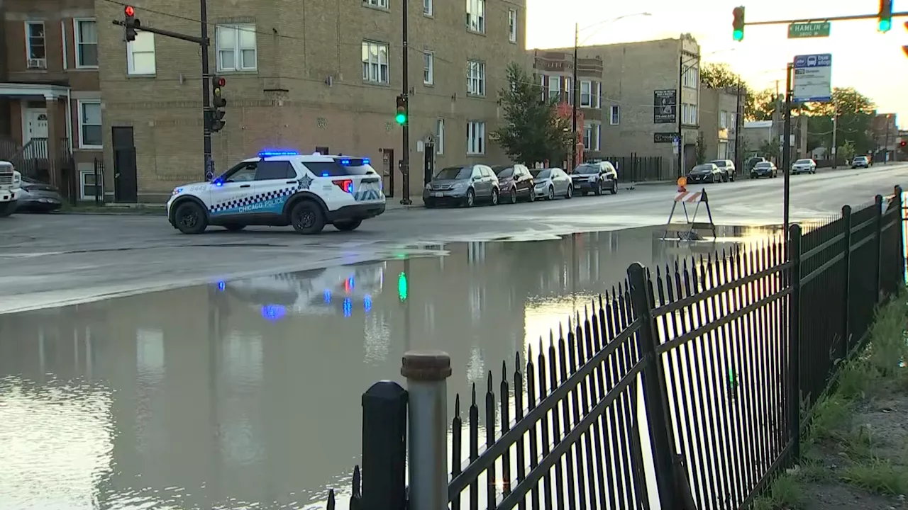 Chicago water main break closes roads and reroutes buses, sends water gushing through street