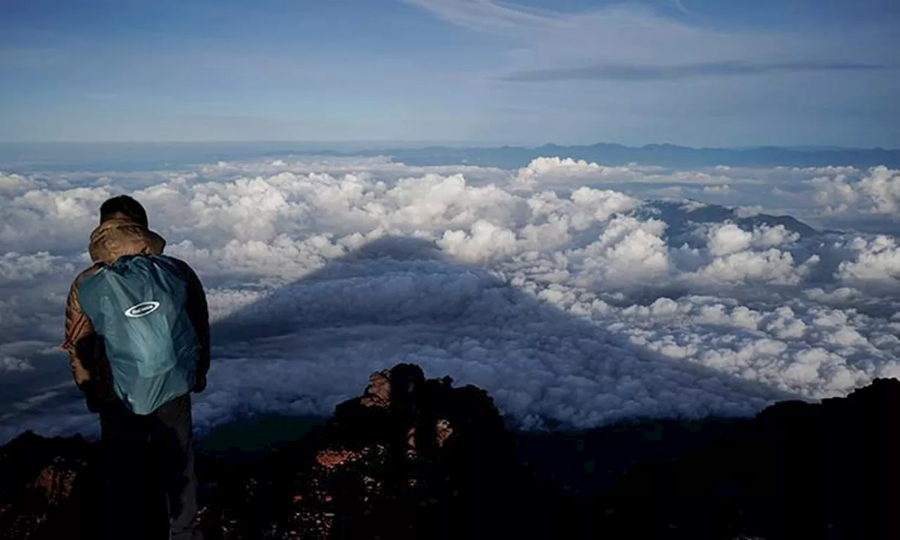 Rescuers seek to bring down bodies found on Japan's Mount Fuji