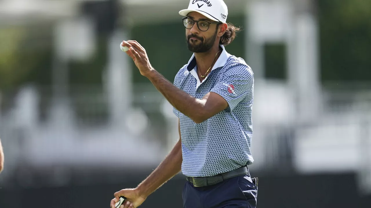 Akshay Bhatia's golf ball falls into a fairway drain, leading to an unusual free drop