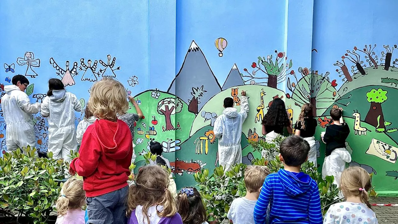 Animali, foreste e città: il mondo è una meraviglia nel murales dei bambini