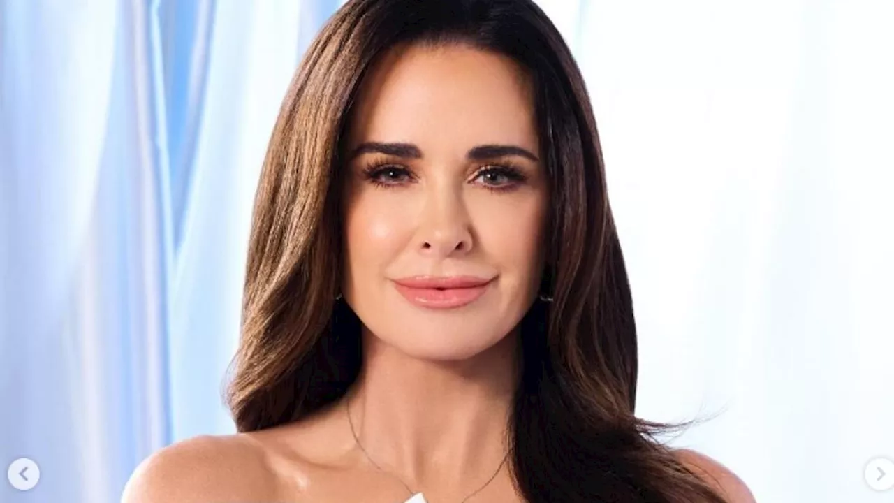 Kyle Richards, 55, is SLAMMED for extreme airbrushing on her new skincare ad as trolls joke she...