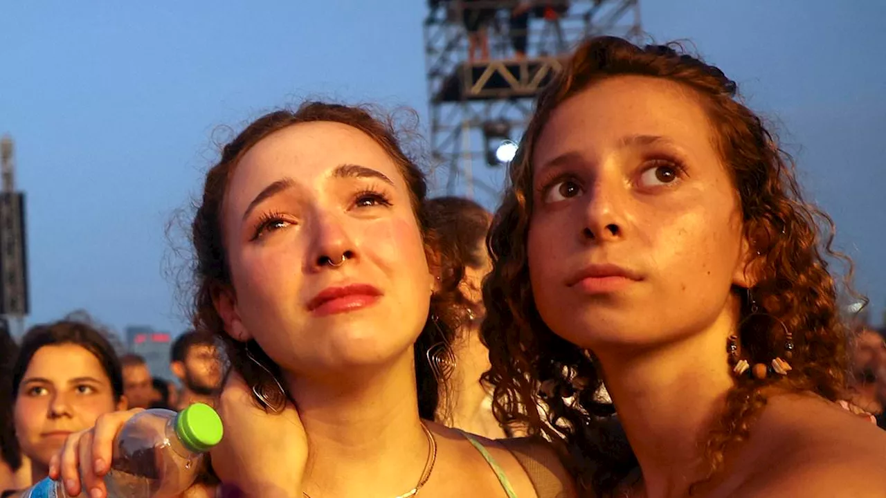 Emotional photos show Oct 7 survivors meeting up at Tel Aviv festival