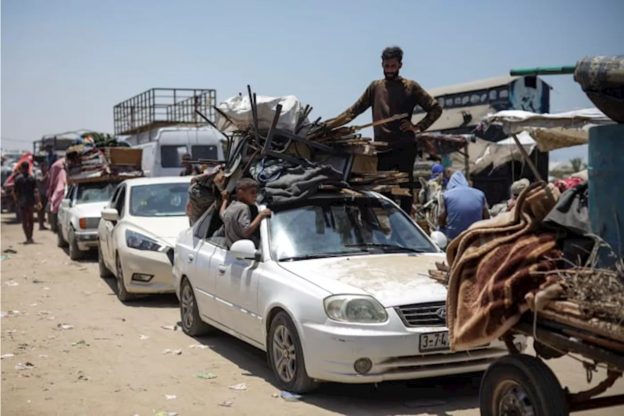  ‘Carry your son and run’: Gaza families describe fleeing Rafah under Israeli fire