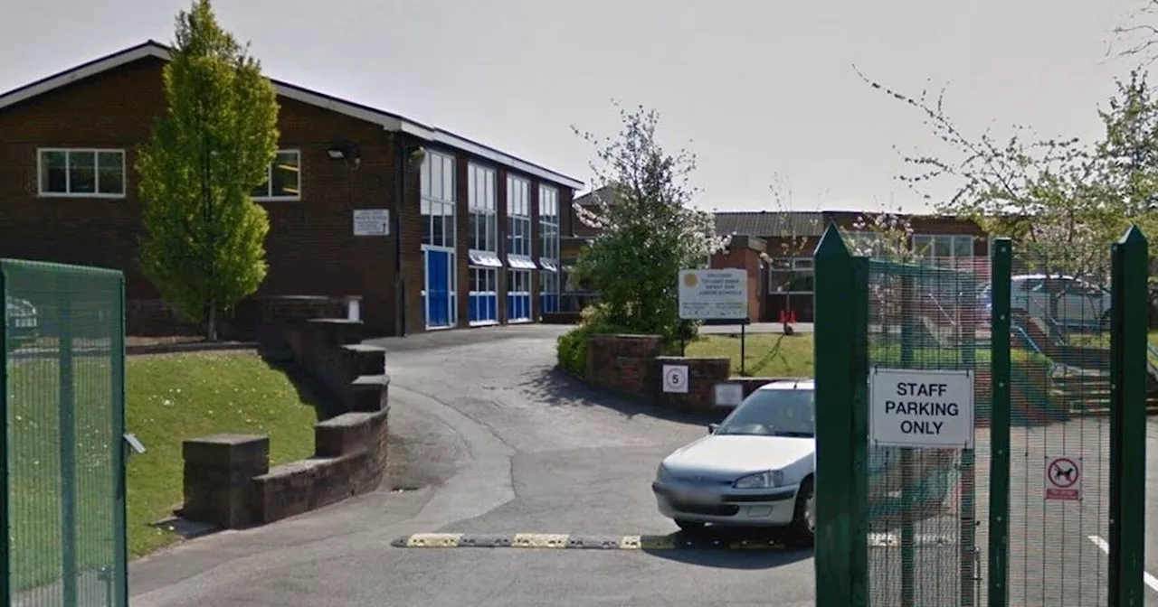 Detectives swoop at Greater Manchester school and make arrest