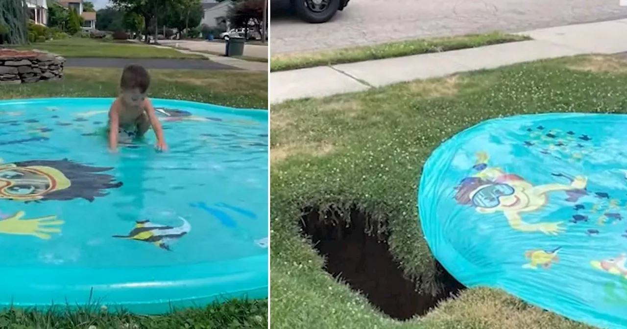 Boy playing on splash pad nearly swallowed by sinkhole in front yard