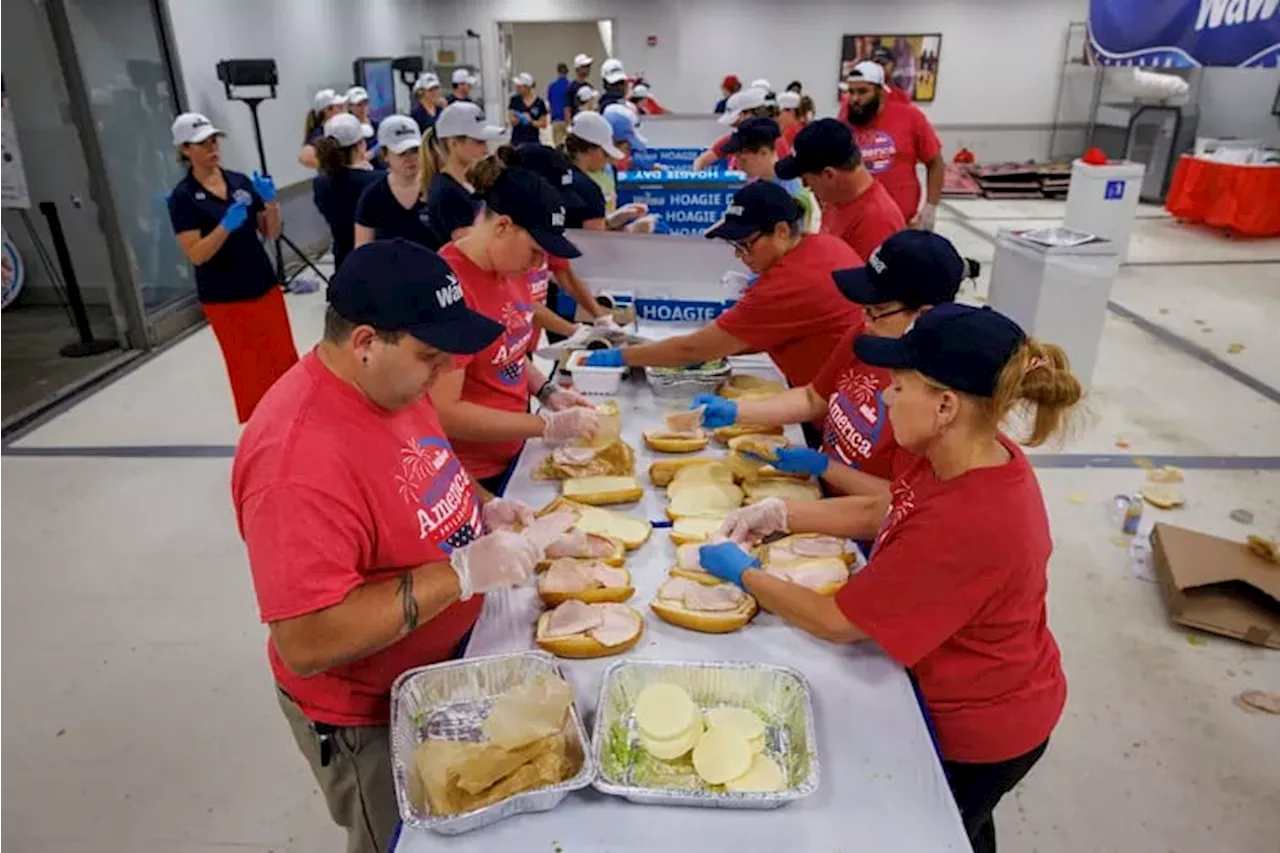 Scenes from Wawa Hoagie Day, when hundreds lined Independence Mall for free sandwiches, swag, and Tastykakes