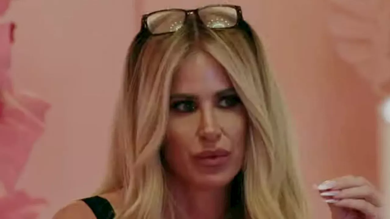 Kim Zolciak, 46, cozies up to Chet Hanks, 33, in BED as he calls her a 'MILF' in Surreal Life: Villa...