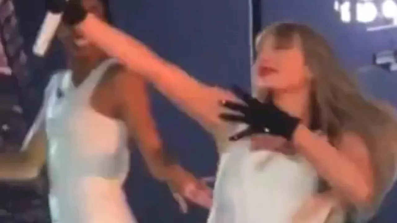 Taylor Swift reenacts boyfriend Travis Kelce's signature bow and arrow move AGAIN during sold-out...