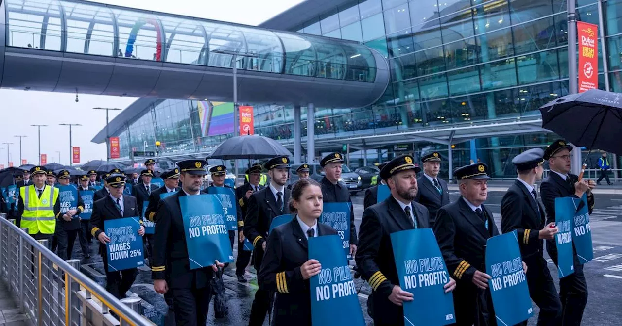 Aer Lingus strike: hundreds of pilots march at Dublin Airport amid eight-hour strike