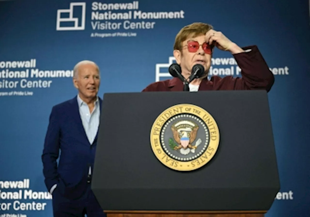 Biden takes stage with Elton John to celebrate LGBTQ milestone