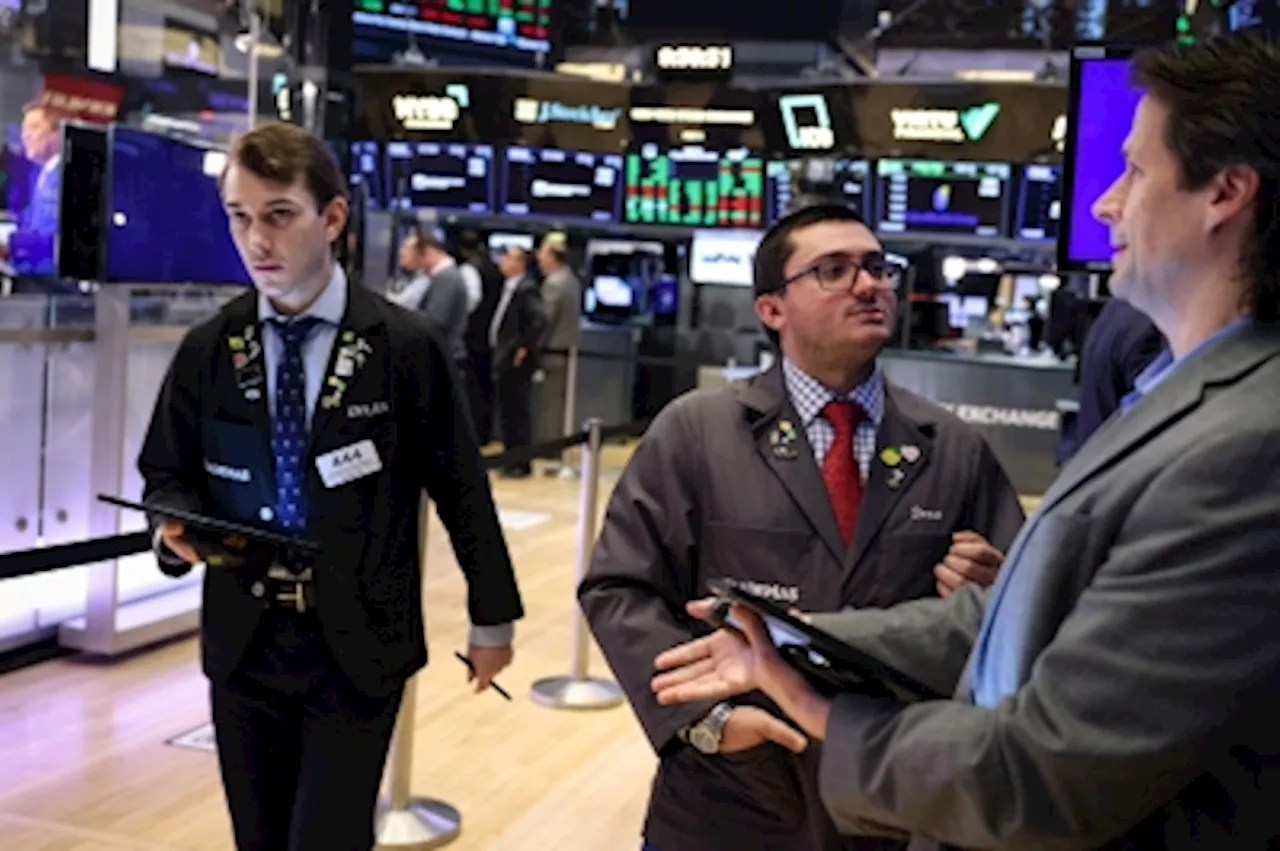 Wall Street ends lower as investors digest inflation data, presidential debate