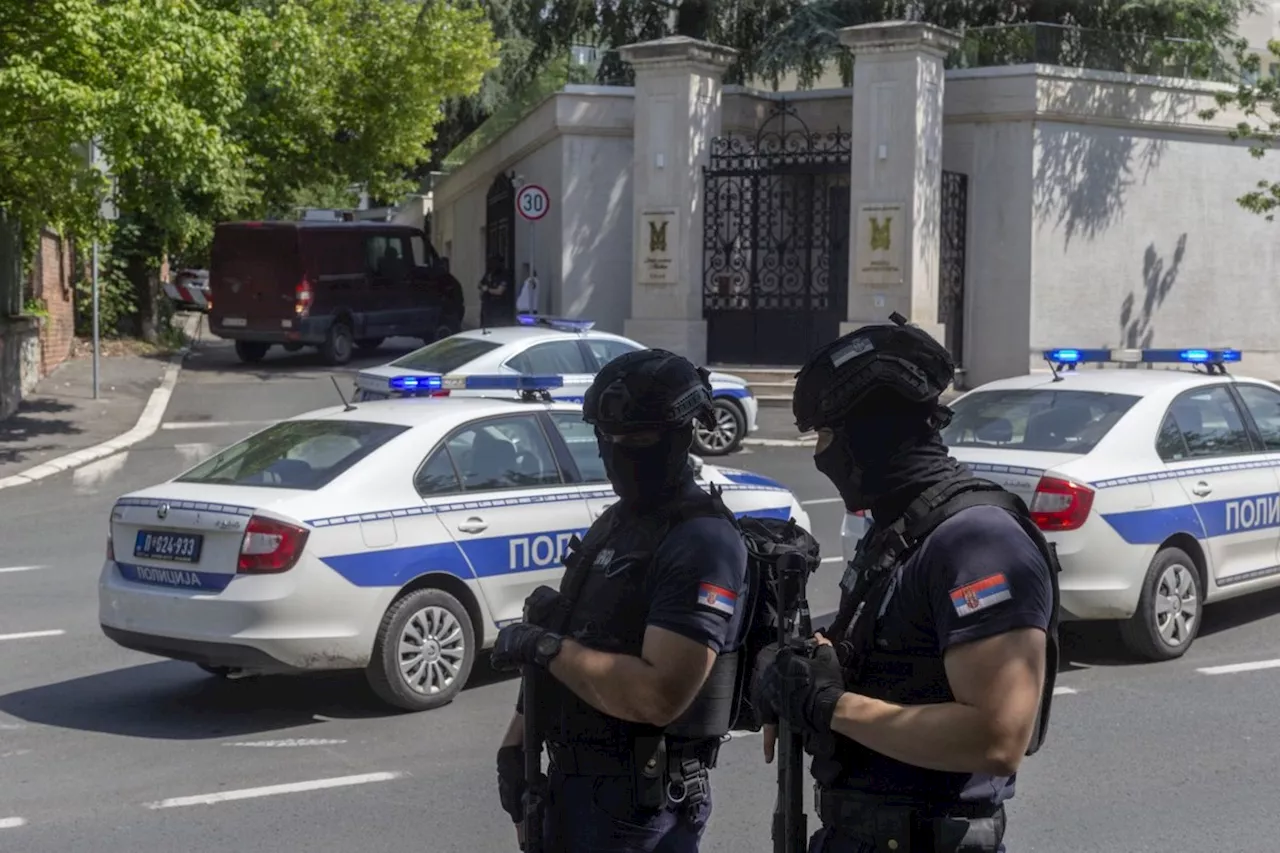 Crossbow attacker wounds a police officer guarding Israel's embassy in Serbia before being shot dead