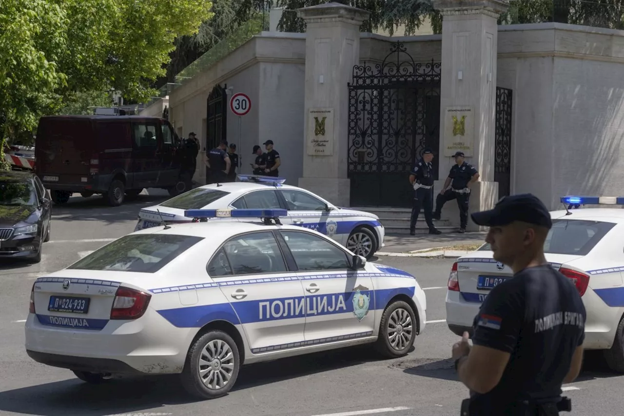 Crossbow attacker wounds a police officer guarding Israel's embassy in Serbia before being shot dead