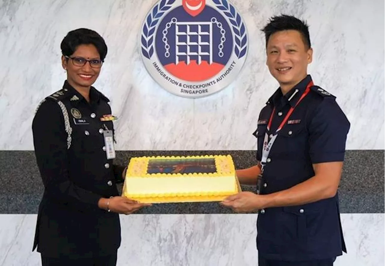 Johor CIQ presents cake to Singapore’s ICA to celebrate Causeway’s 100 anniversary