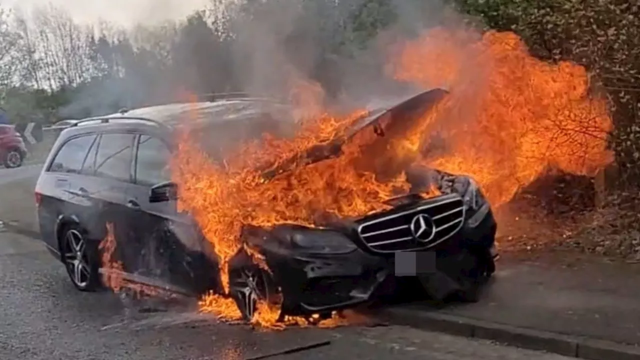 Horror snaps show Mercedes engulfed in flames ‘minutes after repairs’ as driver forced to leap to saf...