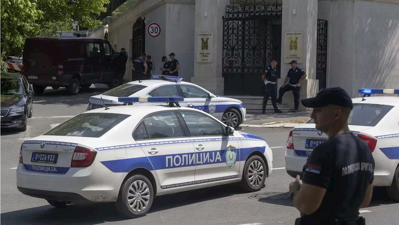 Crossbow attacker wounds a police officer guarding Israel's embassy in Serbia before being shot dead