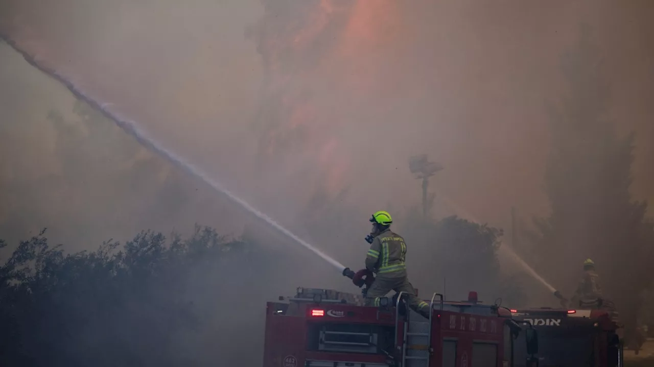 Fires set off by Hezbollah rockets spread through northern Israel