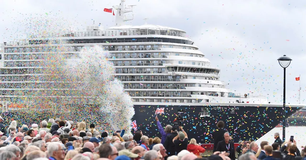 Moment champagne bottle smashes against the Queen Anne