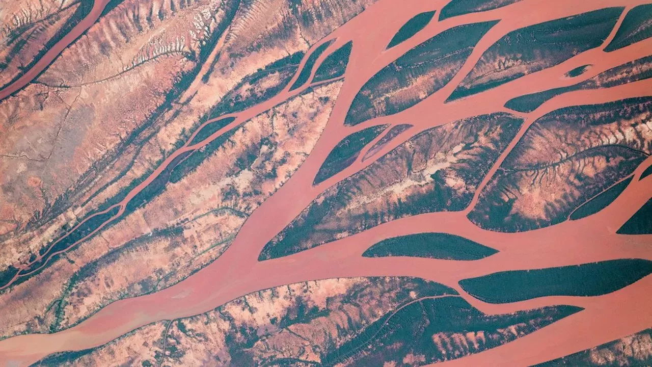 Earth from space: Shapeshifting rusty river winds through Madagascar's ...
