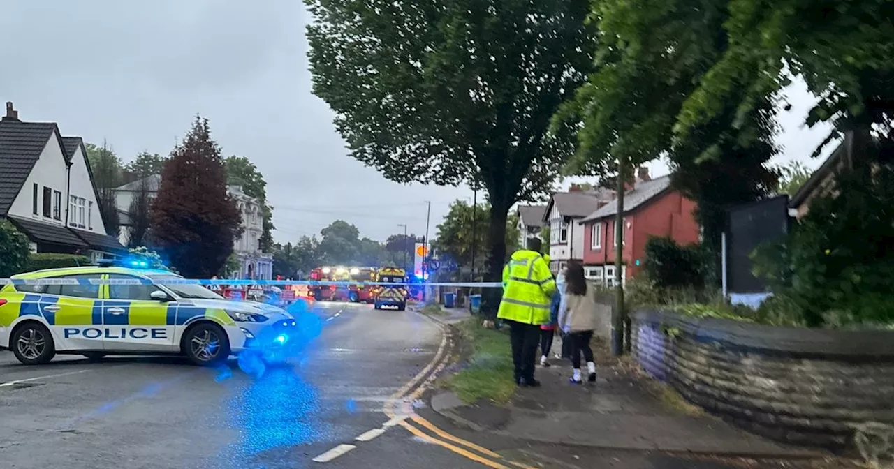 Woman dies after car crashes into lamppost on Greater Manchester street