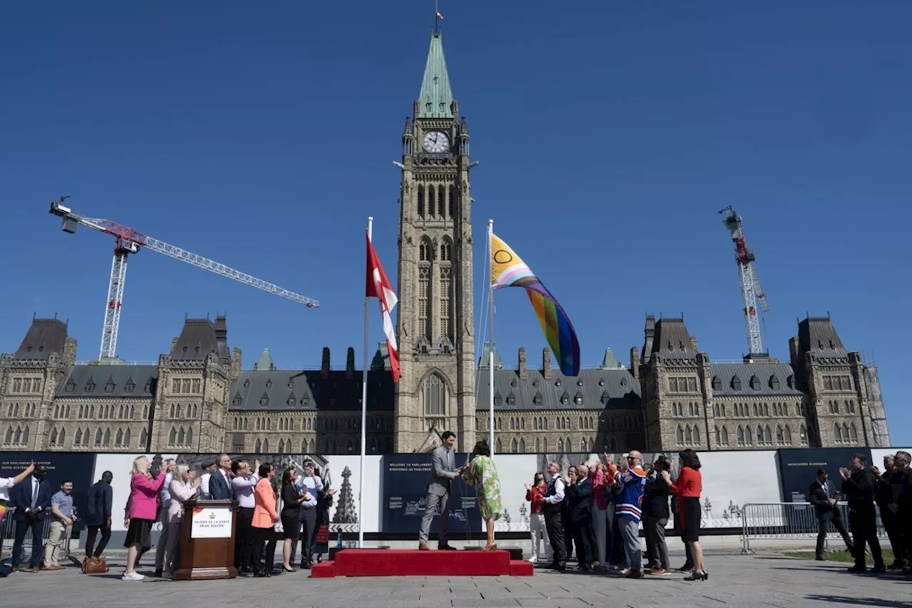 Pride flag raised on Parliament Hill as politicians warn Canada is at a crossroads