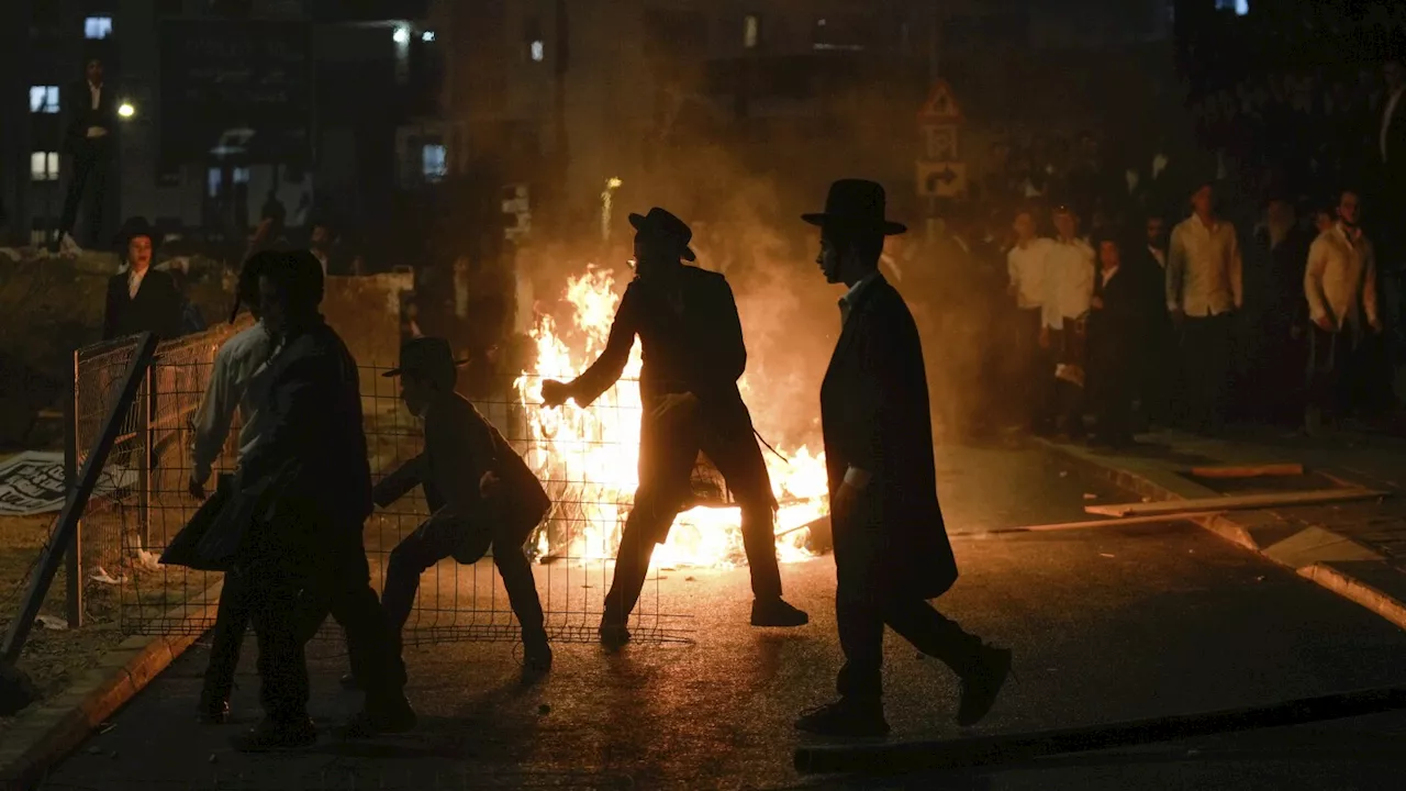 Ultra-Orthodox protest against order to enlist in Israeli military turns violent in Jerusalem