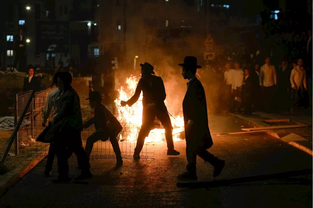 Ultra-Orthodox protest against order to enlist in Israeli military turns violent in Jerusalem