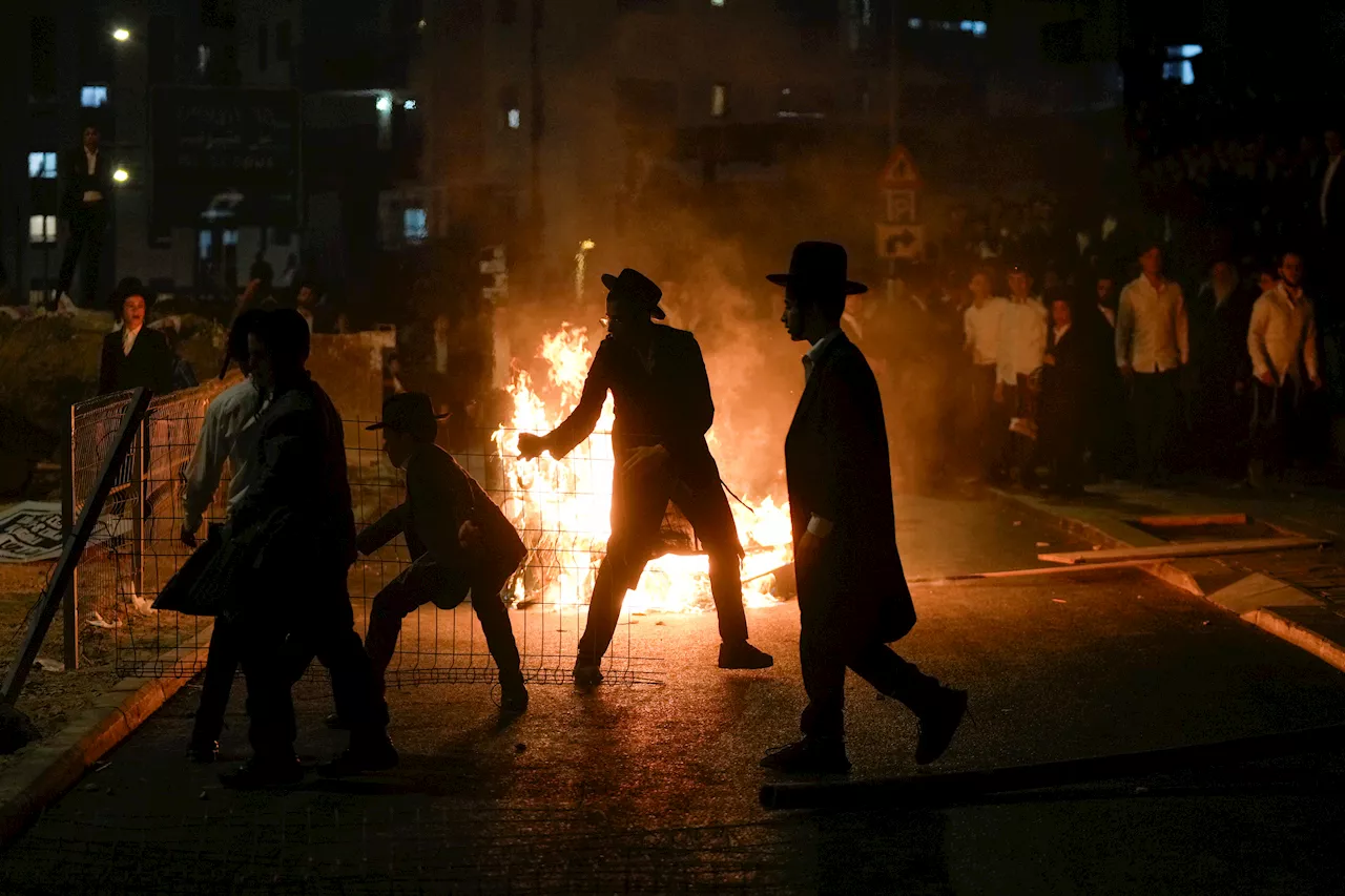 Protests turn violent in Jerusalem as Ultra-Orthodox resist order to enlist in Israeli military