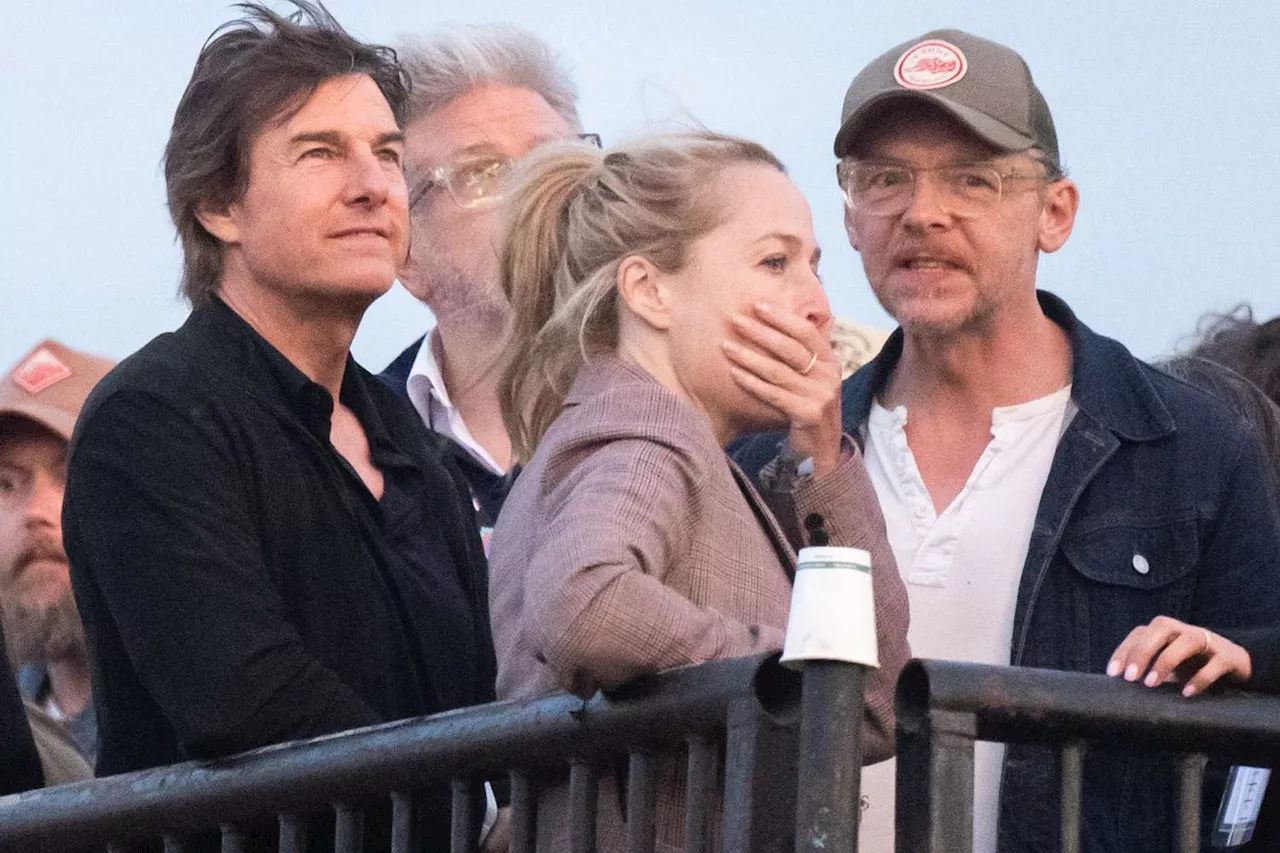 Tom Cruise Attends Coldplay’s Glastonbury Festival Set with Gillian Anderson and Simon Pegg