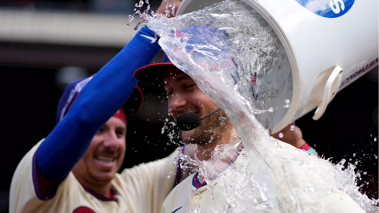 Turner, short-handed Phillies rally past Marlins