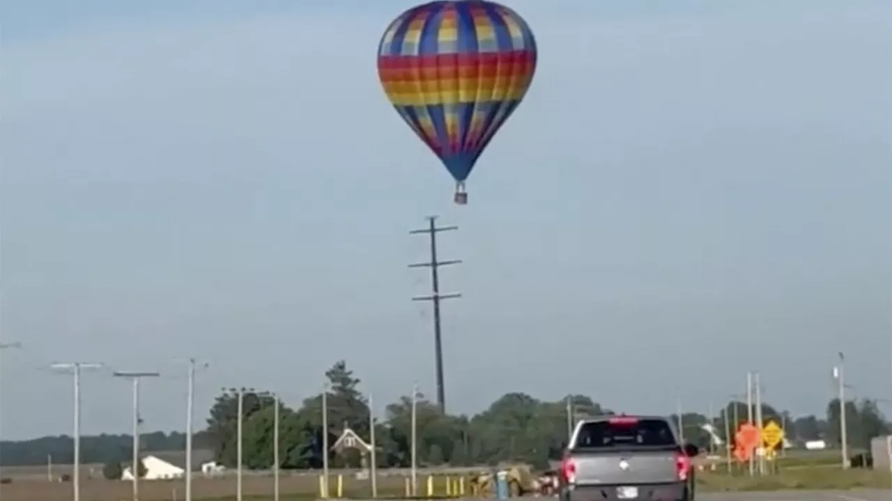 Hot air balloon struck Indiana power lines, burning three people in basket