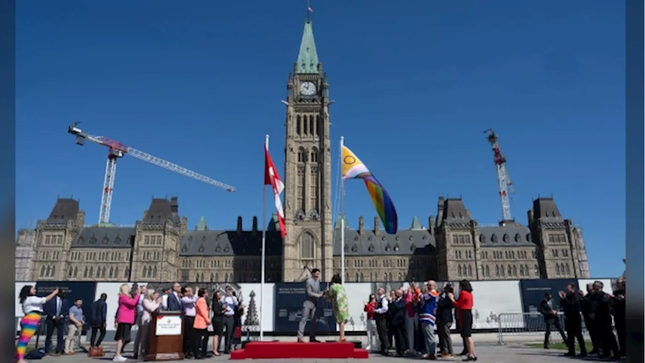 Pride flag raised on Parliament Hill as politicians warn Canada is at a crossroads