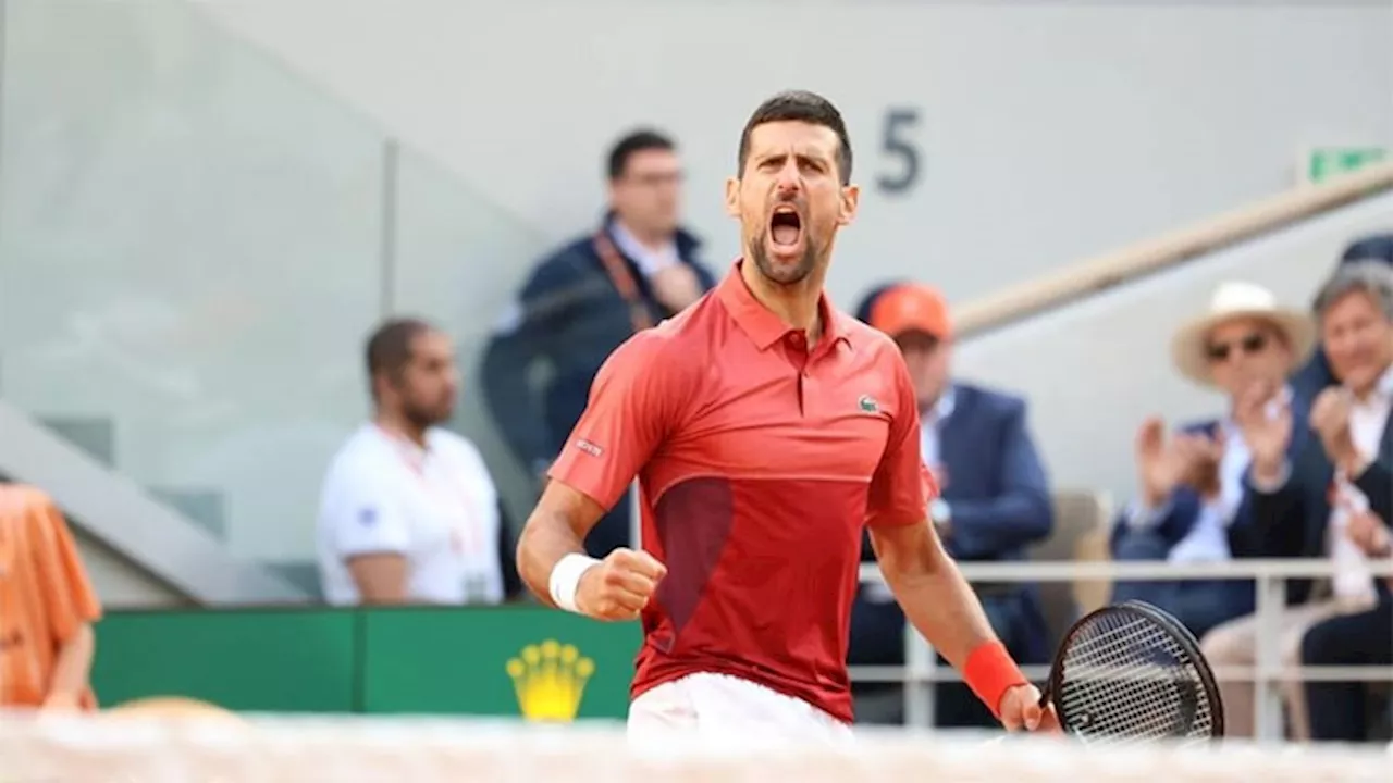 Djokovic into French Open quarter-finals after five-set thriller