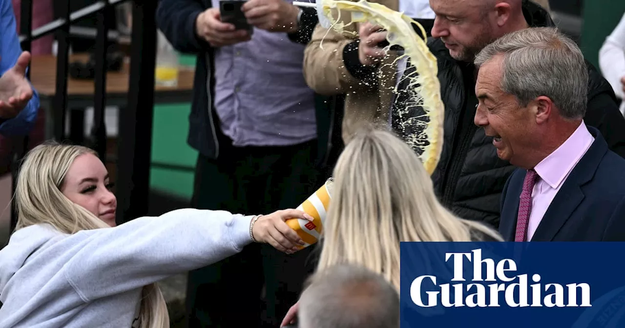 Woman throws milkshake over Nigel Farage on first day of campaigning